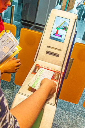 Frankfurt, Germany - July 7, 2010: passengers are using electronic boarding by scanning the bar codeのeditorial素材