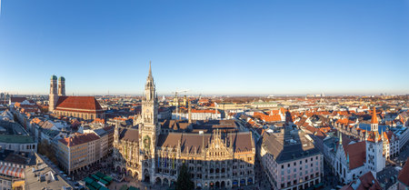 scenic view to famous church of our lady in Munich with view to Marienplatz and new town hallの写真素材
