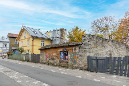 Tallinn, Estonia - October 27, 2024: old historic wooden houses in the poor Kalamaja district, an old fishermen's area become more and more hip for young people.のeditorial素材