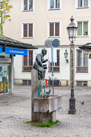 Munich, Germany - November 17, 2024: Sculpture of market woman at the Viktualien Marketのeditorial素材