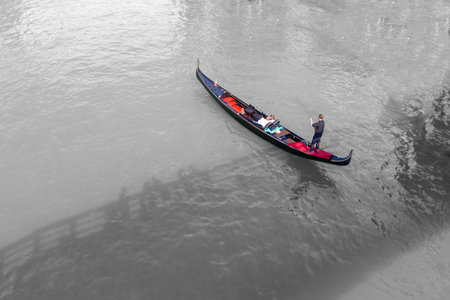 Venice, Italy - April 9, 2007: people enjoy the gondola trip in the Grand Canal in Venice, Italy.のeditorial素材