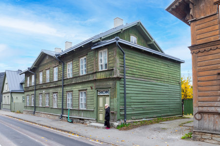Tallinn, Estonia - October 27, 2024: old historic wooden houses in the poor Kalamaja district, an old fishermen's area become more and more hip for young people.のeditorial素材