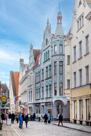Tallinn, Estonia -October 25, 2024: View to old medieval houses in the old town of Tallinn with cobble stone streets.のeditorial素材