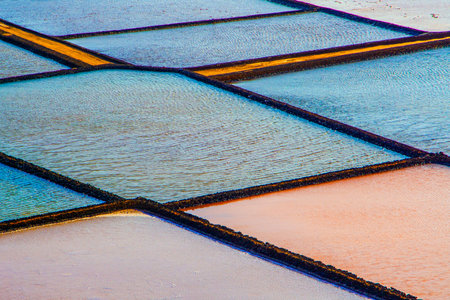 Scenic pattern of colorful basins at the salt mine in the saline of Janobio, Canary Islands, Lanzarote as harmonious backgroundの写真素材