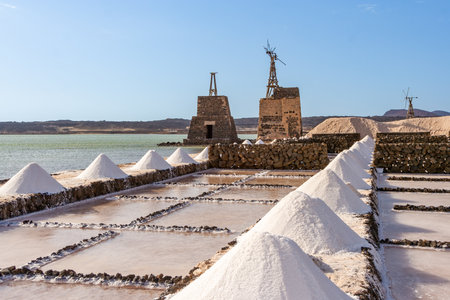 Salt will be produced in the old historic saltworks in Janubio, Lanzarote, Spainの写真素材