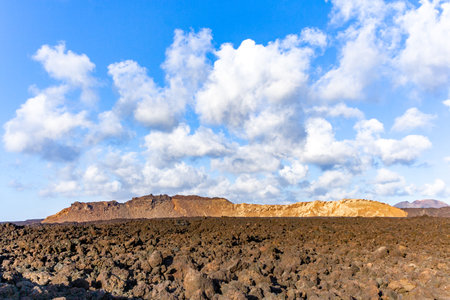 Volcanic landscape at Timanfaya national park from route litoralの写真素材