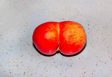 fresh apples with interesting deformations in beautiful light give imagination a hintの写真素材