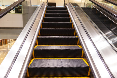 moving staircase in a shopping mall in Hong Kong, Chinaの写真素材