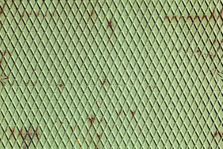 old industrial iron plate painted green as backgroundの写真素材
