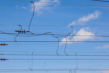 catenary under blue sky for electrified trains in Germanyの写真素材