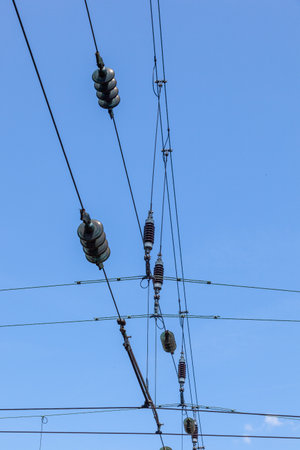 catenary under blue sky for electrified trainsの写真素材