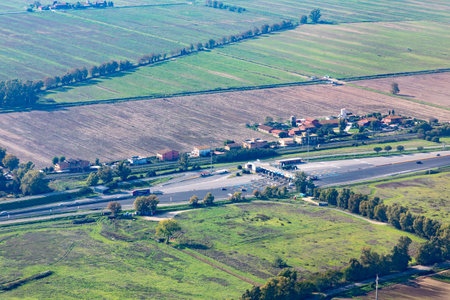 highway E80 toll booth at the roman highway passing the airport leonardo da vinciの写真素材