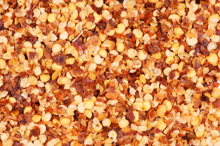Macro photo of crushed red pepper flakesの写真素材