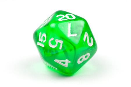 A single green, translucent 20-sided dieの写真素材