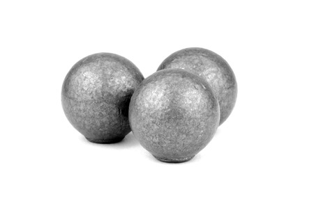 Three lead musket balls on white backgroundの写真素材
