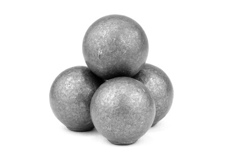 Stack of four lead musket balls on whiteの写真素材
