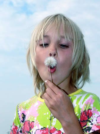 girl and Dandelionの写真素材
