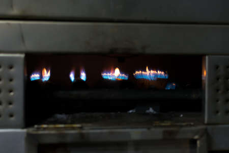 industrial oven for pizzas on, fire insideの写真素材
