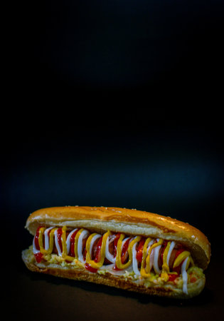 delicious hot dog isolated on a black background. black foodの写真素材