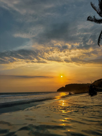 Beautiful sunset on the beach in the tropics. Landscape.の写真素材