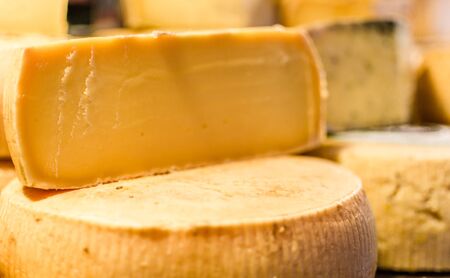 Selection of traditional Italian cheeses on a displayの写真素材