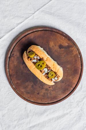 Traditional texas style hot dog against white backgroundの写真素材