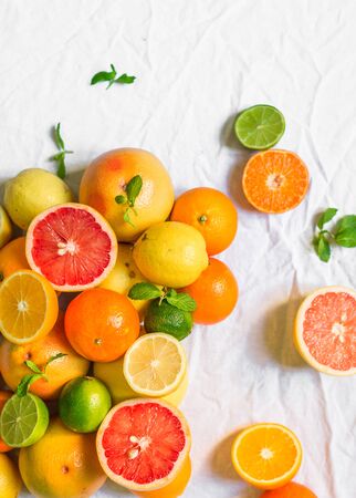Colorful citrus fruit like lemon, lime, orange, grapefruit, tangerineの写真素材