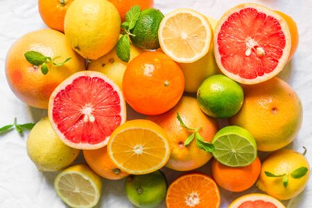 Colorful citrus fruit like lemon, lime, orange, grapefruit, tangerineの写真素材