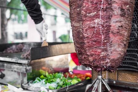 Kebab and grill shawarma meat at a street food marketの写真素材