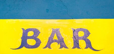 Abstract background of a colorful wall with bar sign. Pattern and texture.