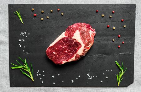 Colorful steak meat from angus wagyu beef against black background.の写真素材