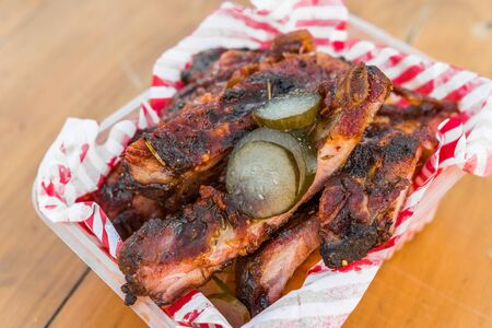 Pork barbecue baby ribs at a street food market.の写真素材