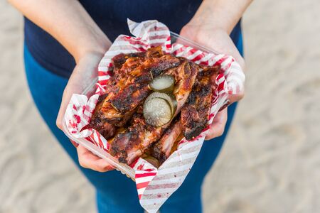 Pork barbecue baby ribs at a street food market.の写真素材
