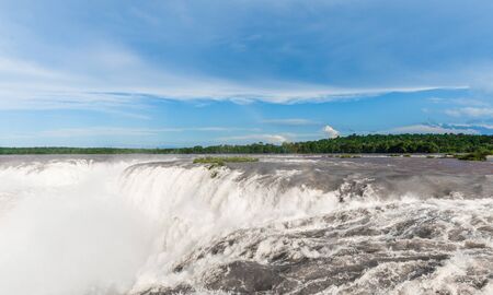 Iguazu waterfalls on a sunny day in summer. Photo at Argentinian, Devil throatの写真素材