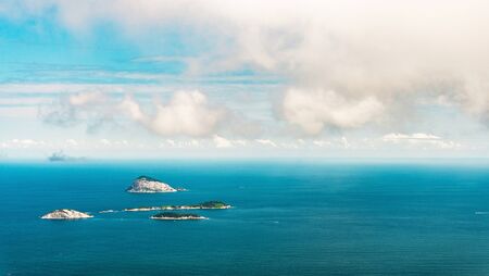 Tropical islands with beaches in the blue sea ocean in summer in Brazil.の写真素材