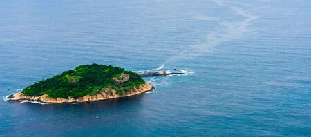Tropical islands with beaches in the blue sea ocean in summer in Brazil.の写真素材