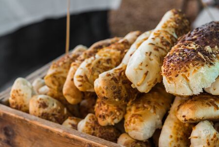 Freshly baked baguette bread loaves at a street food market fair festival