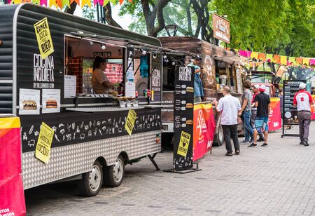 Buenos Aires, Argentina - November 25, 2018: Food trucks at street food marketのeditorial素材