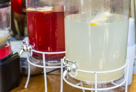 Selection of refreshing and colorful lemonades at a street food marketの写真素材