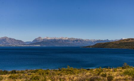 Landscape of blue lakes, Andes mountains, and forest in Patagonia, Argentina.の写真素材
