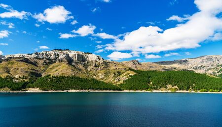 Landscape of blue lakes, Andes mountains, and forest in Patagonia, Argentina.の写真素材