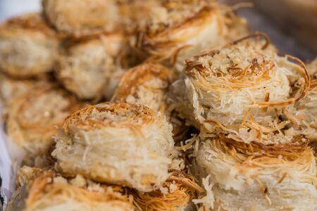 Birds nest knafeh kunafa arabic arab sweet dessert food at a street food market.の写真素材