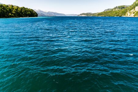Landscape of blue lakes, Andes mountains, and forest in Patagonia, Argentinaの写真素材