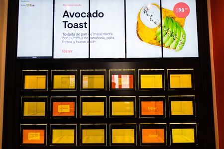 Buenos Aires, Argentina - March 21, 2019: Food compartments in automated cafe