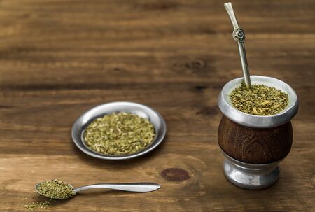 Traditional Argentinian yerba mate tea in a calabash gourd .の写真素材