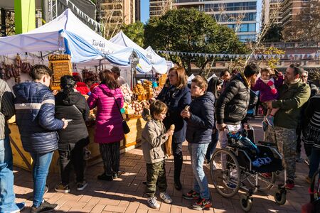 Buenos Aires, Argentina - July 8, 2019: People at a street food market festivalのeditorial素材