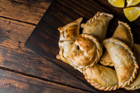 Traditional baked Argentine empanadas savoury pastries with beef stuffingの写真素材