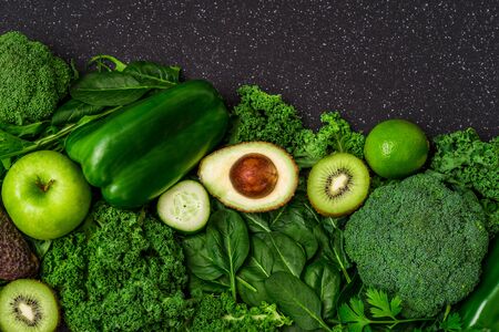 Selection of healthy green food fresh vegetables and fruitの写真素材