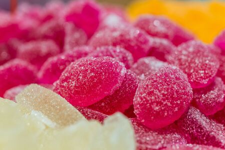 Assortment of sweet dessert colorful fruit jelly candy. Food background pattern.の写真素材