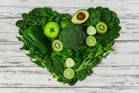 Selection of healthy green food fresh vegetables and fruitの写真素材